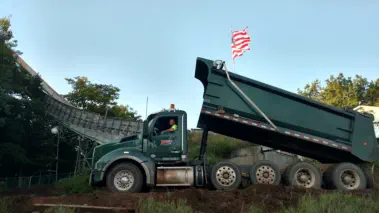 Bacco truck in front of wooden ski jump